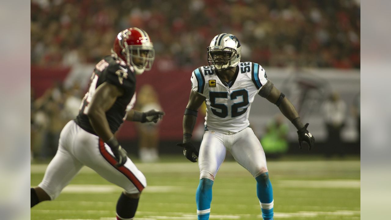 Carolina Panthers' Jon Beason, right, and Dan Morgan, left, work