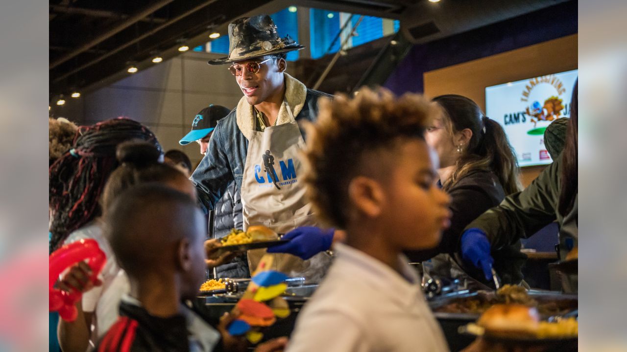 Cam Newton holds annual 'Thanksgiving Jam' for 1,200 children and their  families 