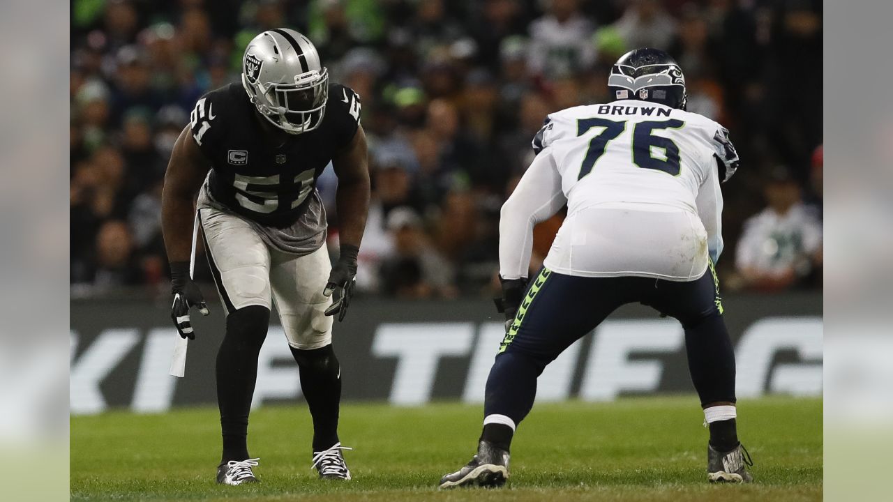 FILE - Seattle Seahawks offensive tackle Duane Brown (76) gets set