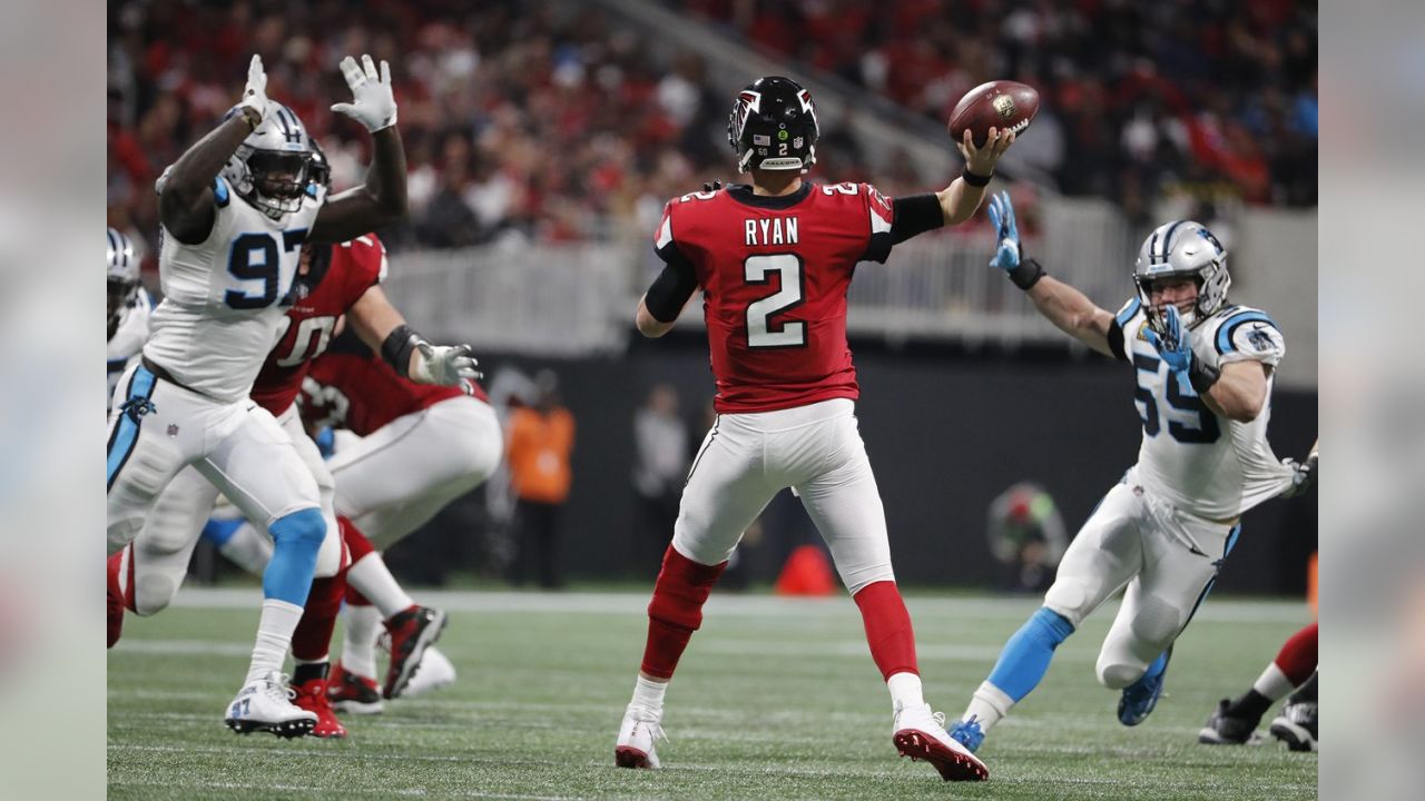 PHOTO: Falcons QB Matt Ryan shows off his Luke Kuechly Panthers jersey 