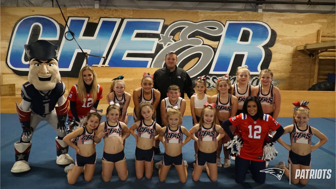 Patriots Cheerleaders participate in Papa Gino's Pizza and Pom Poms