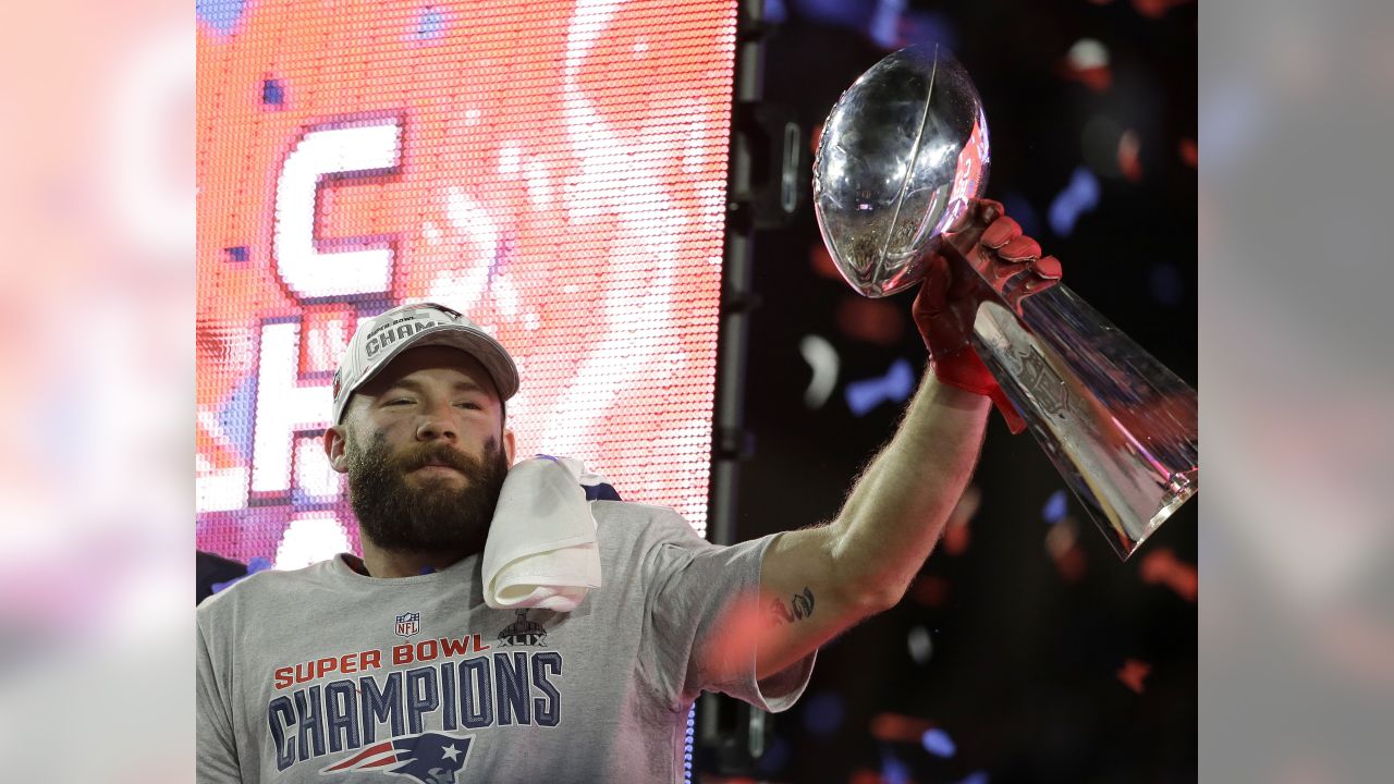 New England Patriots Rob Ninkovich (50) and WR Julian Edelman (R) celebrate  a Malcolm Butler interception of a Seattle Seahawks pass with 26 seconds  remaining in Super Bowl XLIX at University of