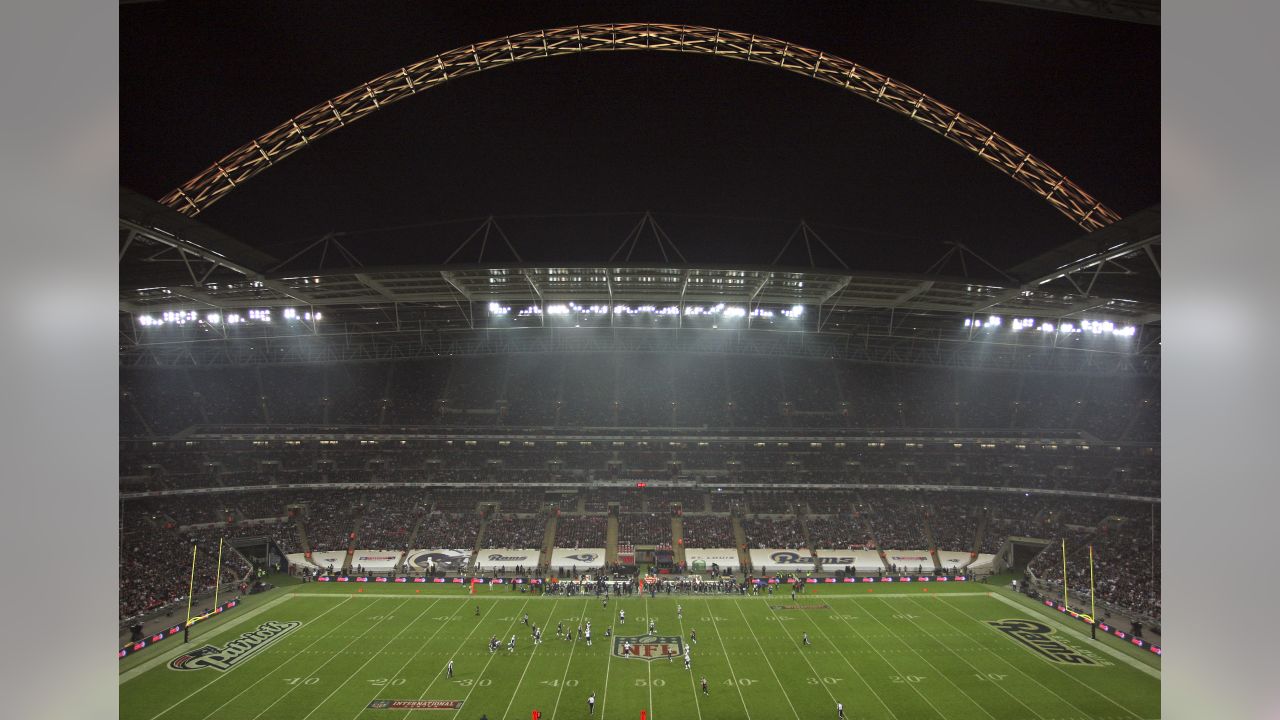 New England Patriots quarterback Tom Brady looks for the pass in the fourth  quarter against the St. Louis Rams during the NFL International Series 2012  game at Wembley Stadium 28 October. Tom