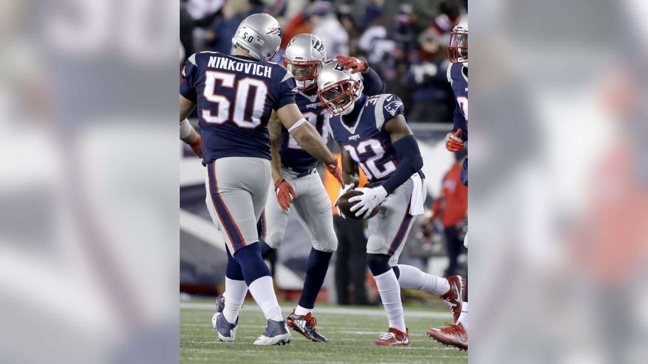 New England Patriots free safety Devin McCourty (32) celebrates with New  England Patriots defen …