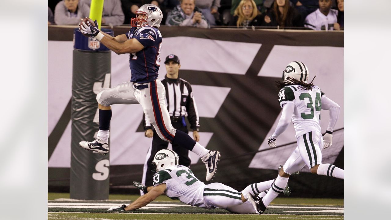 New England Patriots' Deion Branch (84) celebrates with teammate Rob  Gronkowski (87) after scoring a touchdown during the fourth quarter of an  NFL football game, Sunday, Nov. 13, 2011, in East Rutherford