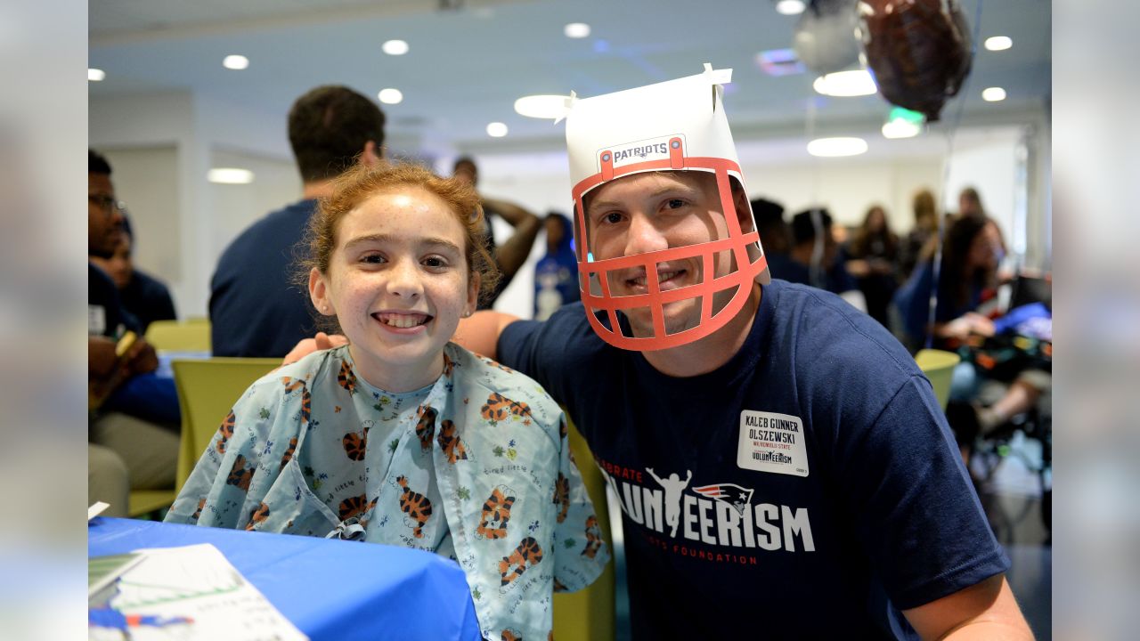 Indianapolis Colts mascot Blue joins Mac Jones of the New England News  Photo - Getty Images