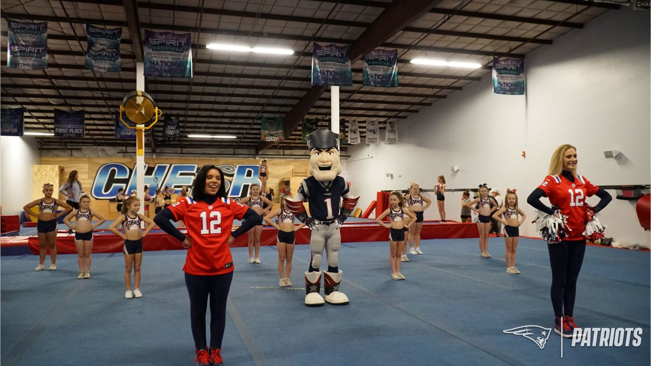 Patriots Cheerleaders participate in Papa Gino's Pizza and Pom Poms