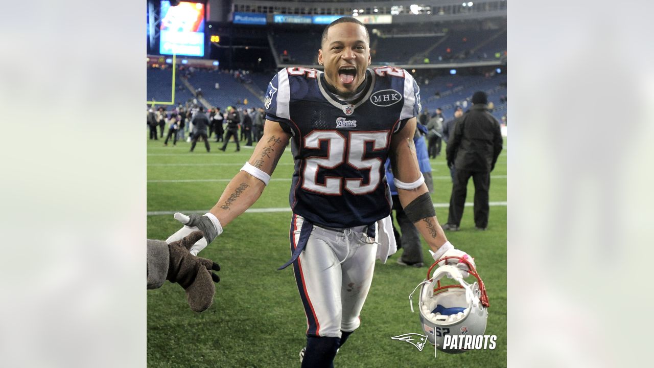 New England Patriots safety Patrick Chung stands courtside with