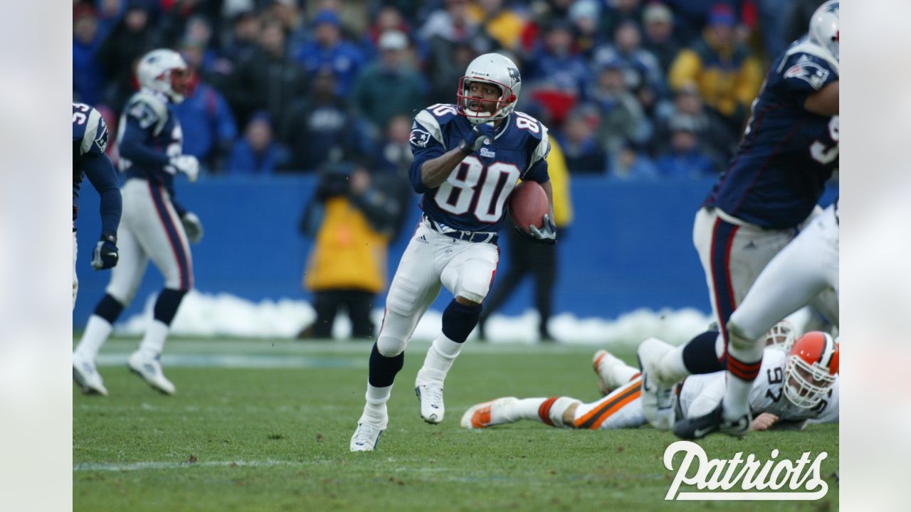 New England Patriots wide receiver Troy Brown (80) returns a punt