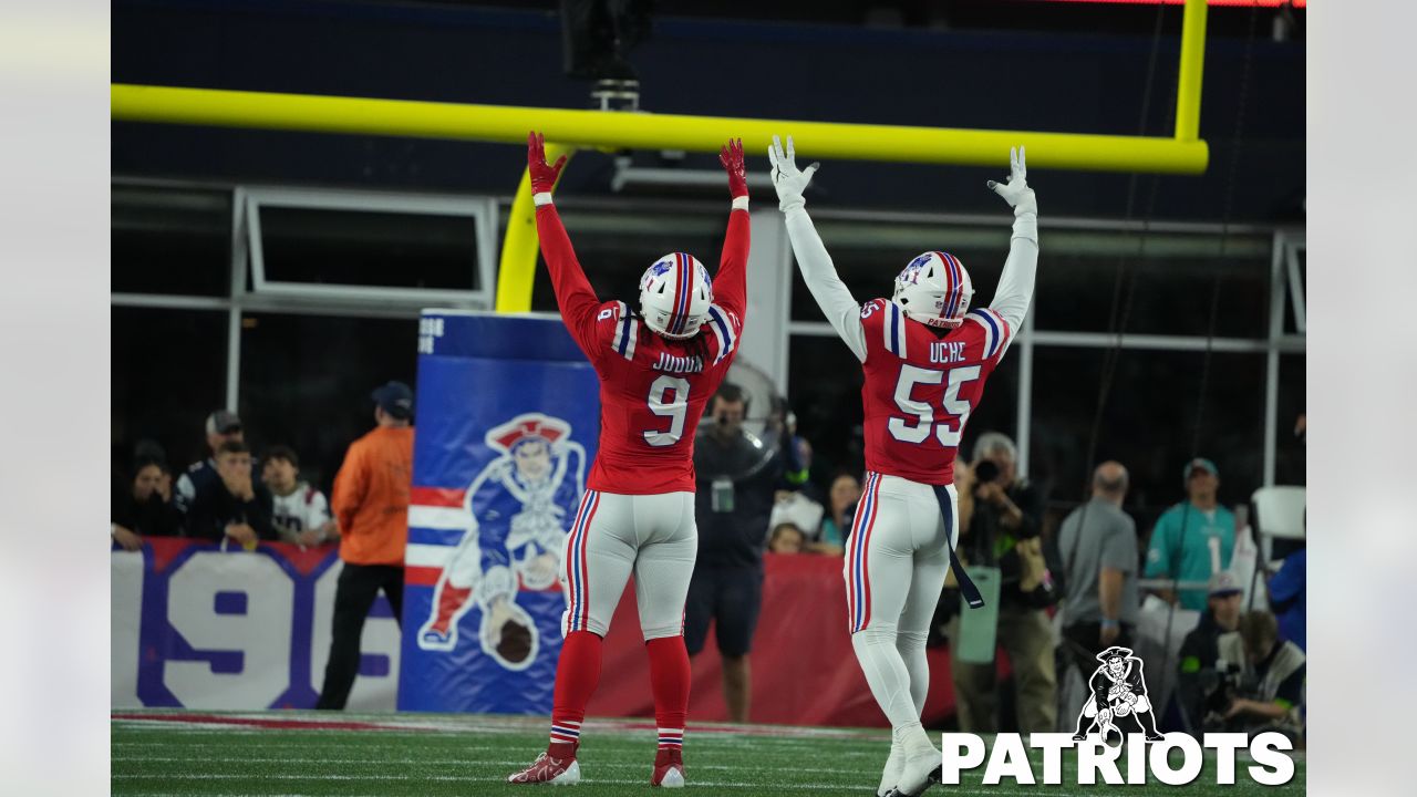 Miami Dolphins vs. New England Patriots. Fans support on NFL Game.  Silhouette of supporters, big screen with two rivals in background Stock  Photo - Alamy