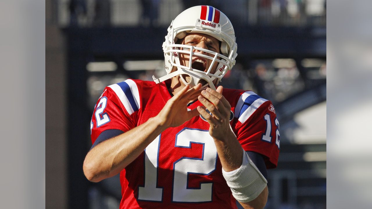 New England Patriots' Aaron Hernandez (81) is tackled by New York Jets'  Kyle Wilson (20) and Jim Leonhard (36) during the third quarter of an NFL  football game Sunday, Nov. 13, 2011