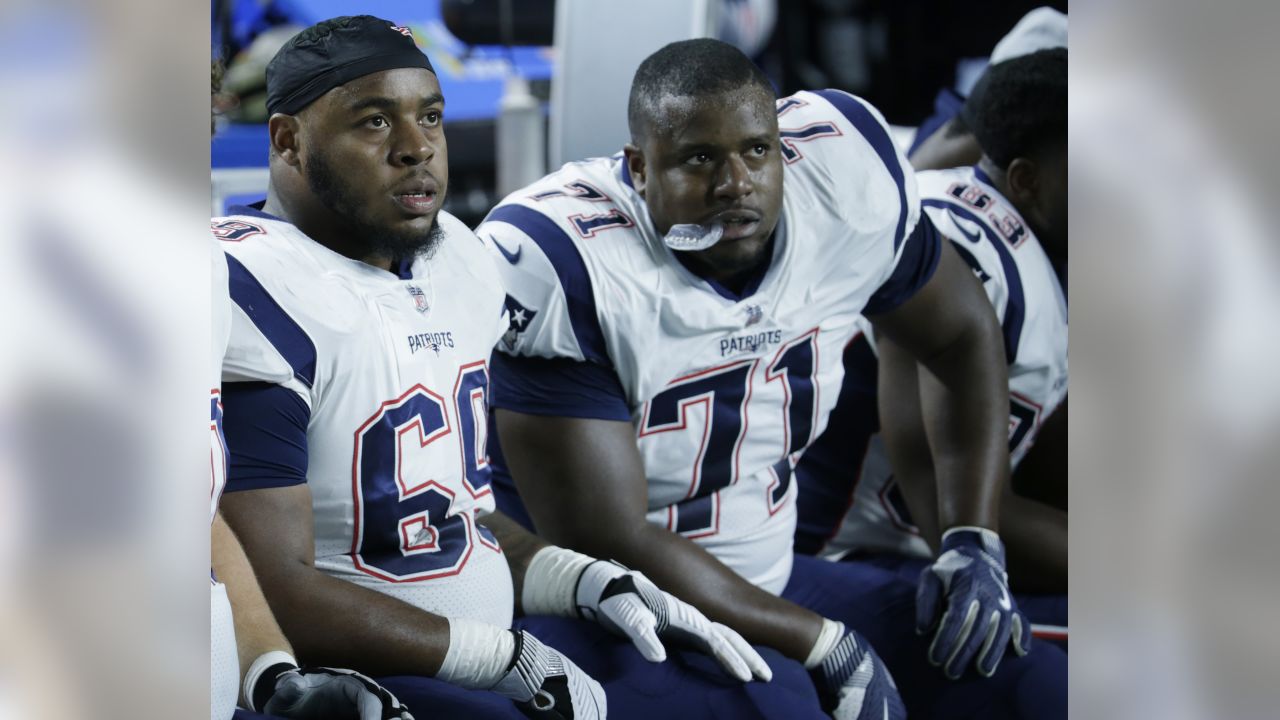 New England Patriots guard Shaq Mason (69) warms up before an NFL