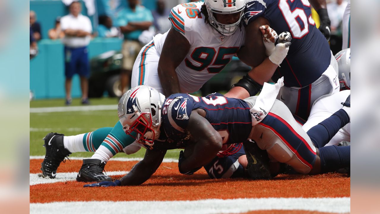 A Washington Redskins player wears Crucial Catch gloves during the second  half of an NFL football game against the Miami Dolphins, Sunday, Oct. 13,  2019, in Miami Gardens, Fla. (AP Photo/Wilfredo Lee