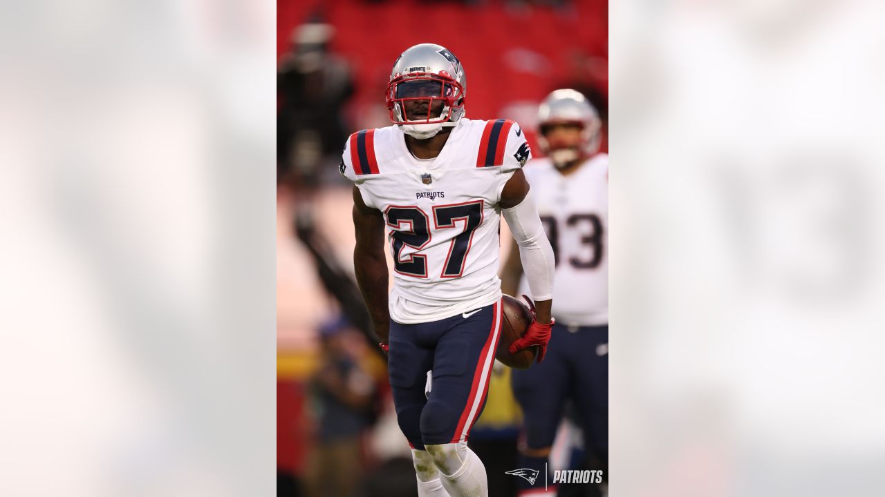 New England Patriots defensive end Lawrence Guy, left, and Isaiah Wynn  celebrate after teammate Nick Folk kicked a field goal during the second  half of an NFL football game against the Buffalo