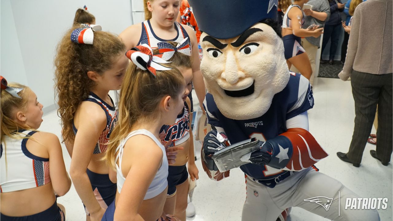 Patriots Cheerleaders participate in Papa Gino's Pizza and Pom Poms