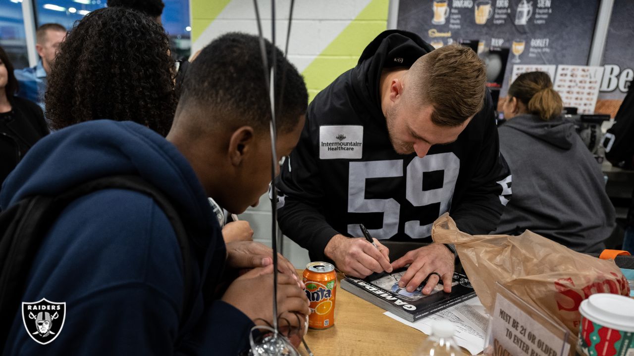 Raiders, Smith's take Las Vegas families on 'Holiday Huddle