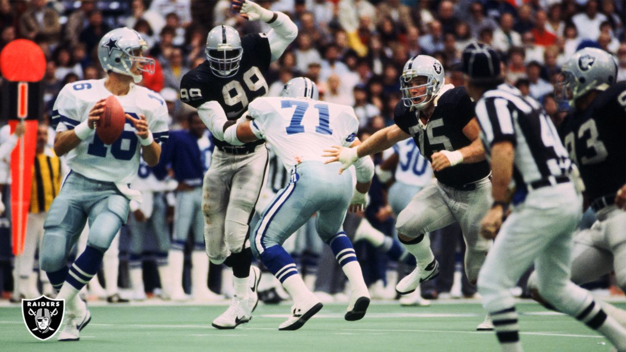 Oakland, California, USA. 7th Dec, 1980. Oakland Raiders vs Dallas Cowboys  at Oakland-Alameda County Coliseum Sunday, December 7, 1980 Oakland Running  back Mark Van Eeghen pushes for extra yardage. Raiders lost to