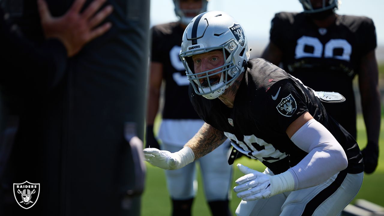 Raiders defensive end Maxx Crosby runs out of sack dances