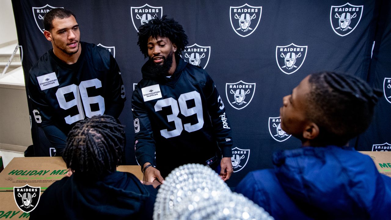 We didn't have a lot, but we did have family': Nate Hobbs, Tashawn Bower  spend quality time with North Las Vegas families during meal donation