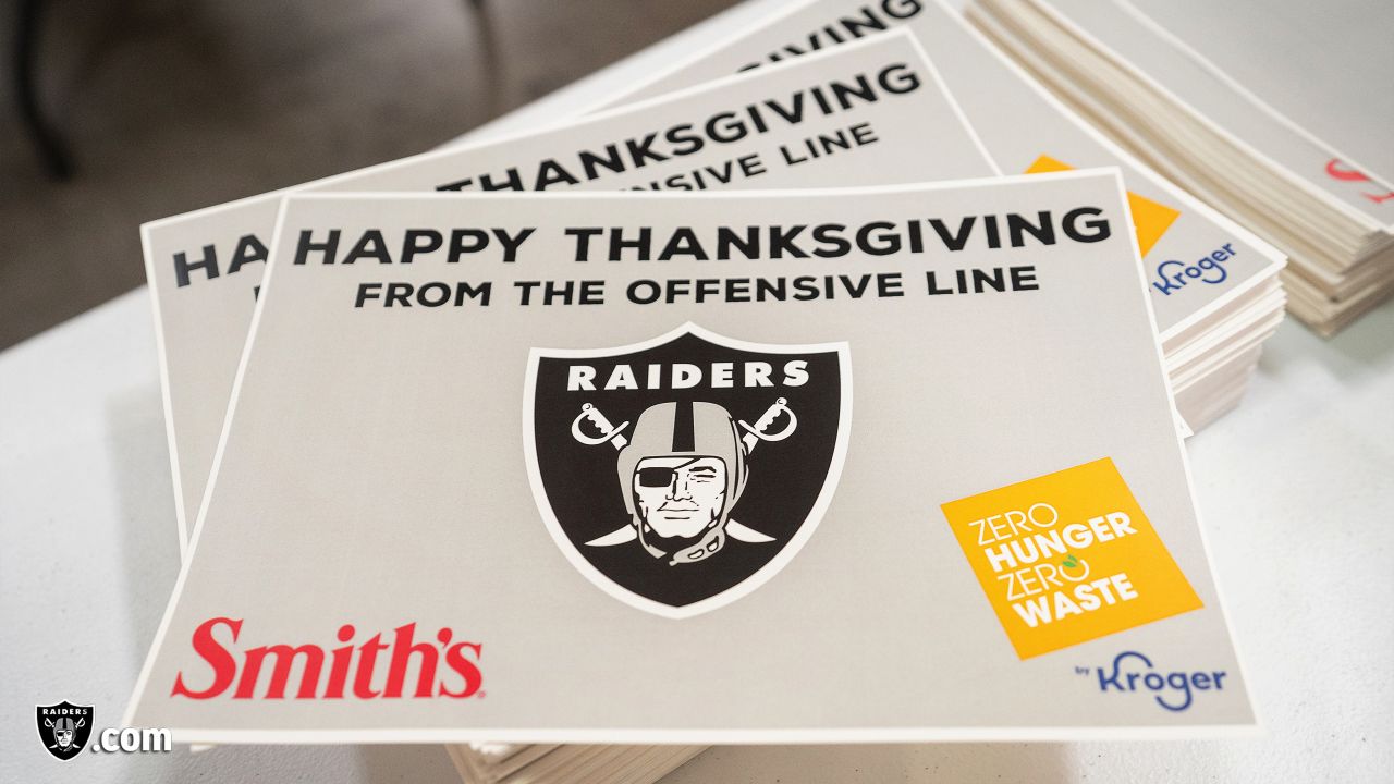 Raiders tackle hunger by dishing out Thanksgiving meals