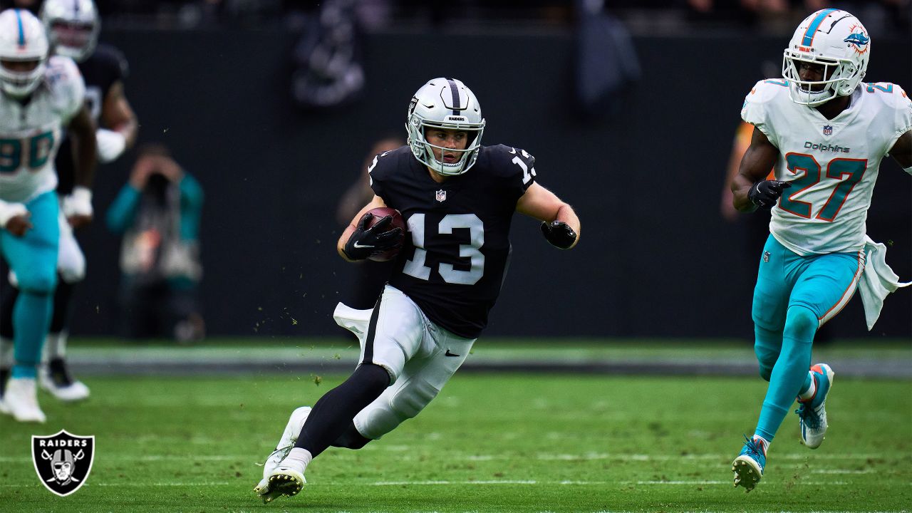 FILE - Las Vegas Raiders wide receiver Hunter Renfrow (13) runs the ball  against the Kansas City Chiefs during the first half of an NFL football game  Jan. 7, 2023, in Las