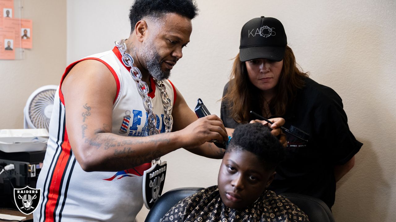 Las Vegas Raiders help local students with back-to-school haircuts