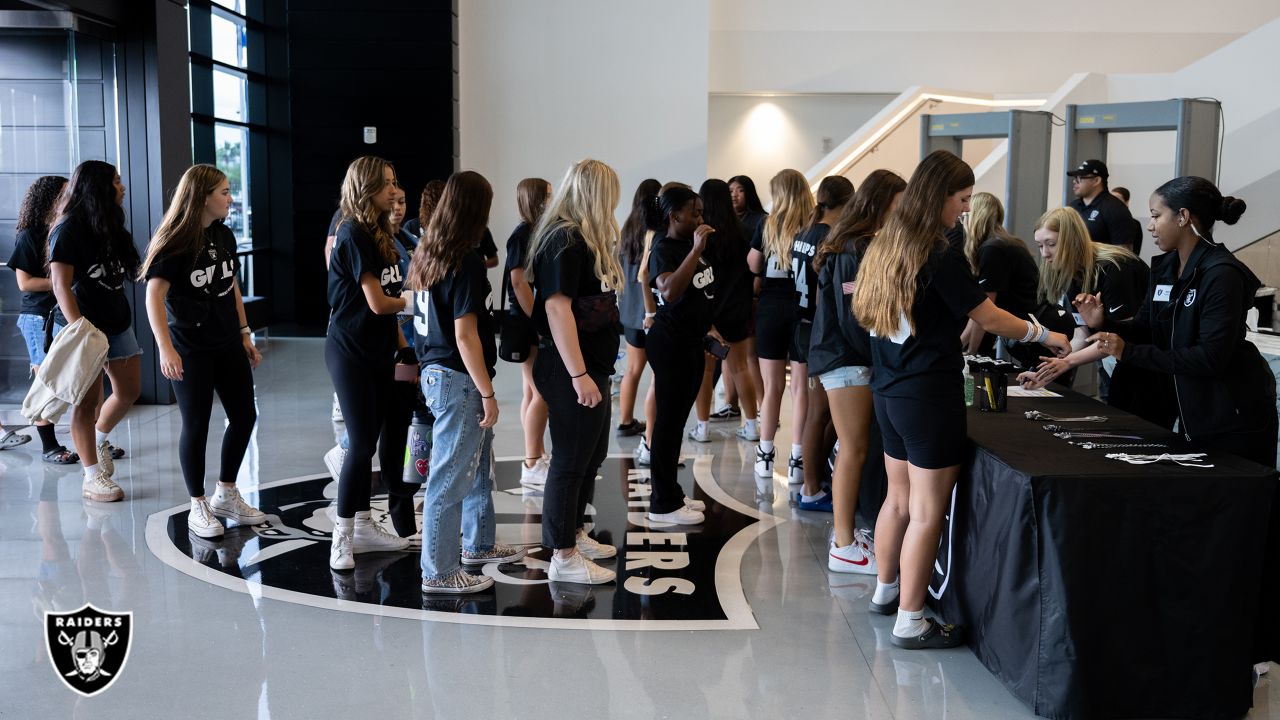 This Dallas Cowboys Cheerleader, Angela (the team does not publicize the  last names of its cheerleading squad members), and about 35 others,  entertain the crowd at a National Football League game at