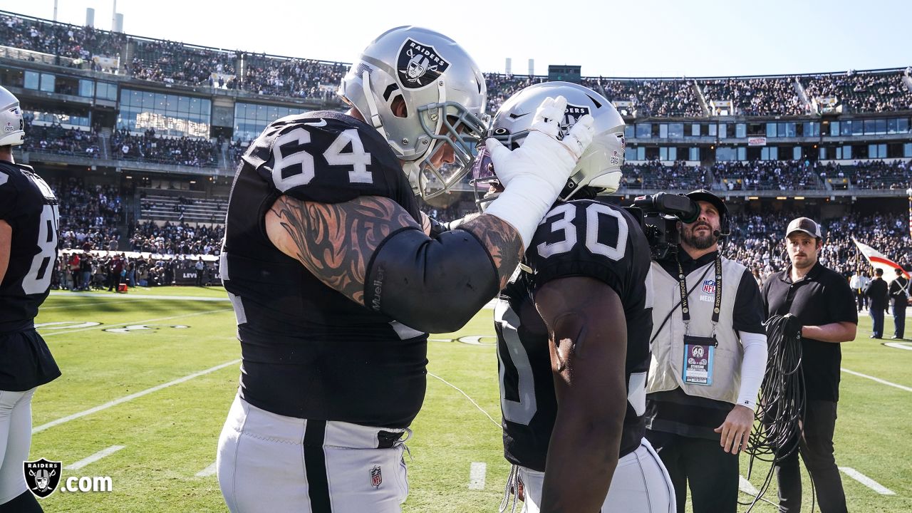 Las Vegas Raiders guard Richie Incognito (64) speaks to Los