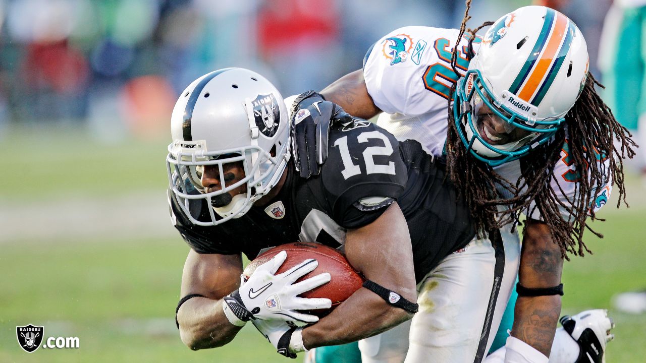 Oakland Raiders wide receiver Jacoby Ford (12) runs past the