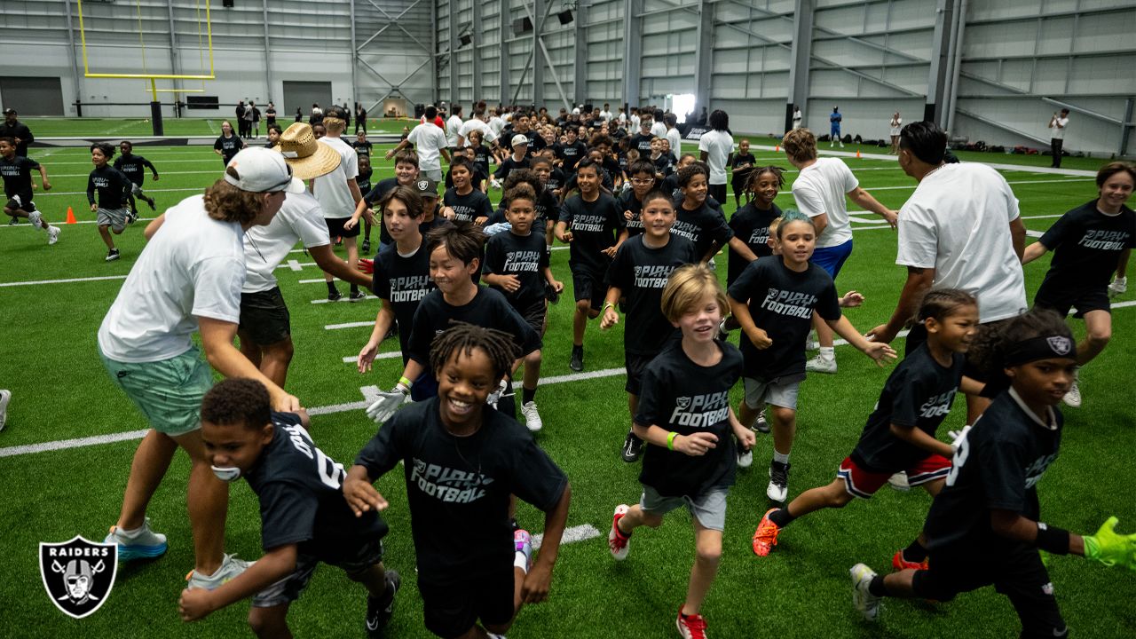 Photos: Local youth participate in Raiders Play Football Skills Camp