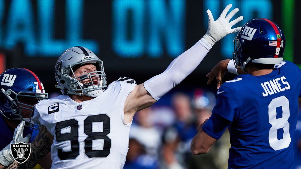 AFC defensive end Maxx Crosby of the Las Vegas Raiders (98) celebrates  after a play against the NFC during the Pro Bowl NFL football game, Sunday,  Feb. 6, 2022, in Las Vegas. (