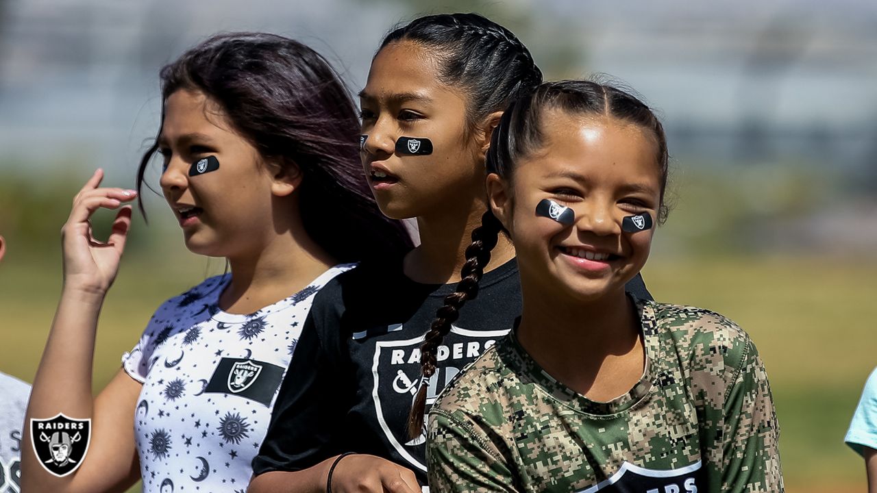 Photos: Raider Rusher takes part in Spirit Day at local school