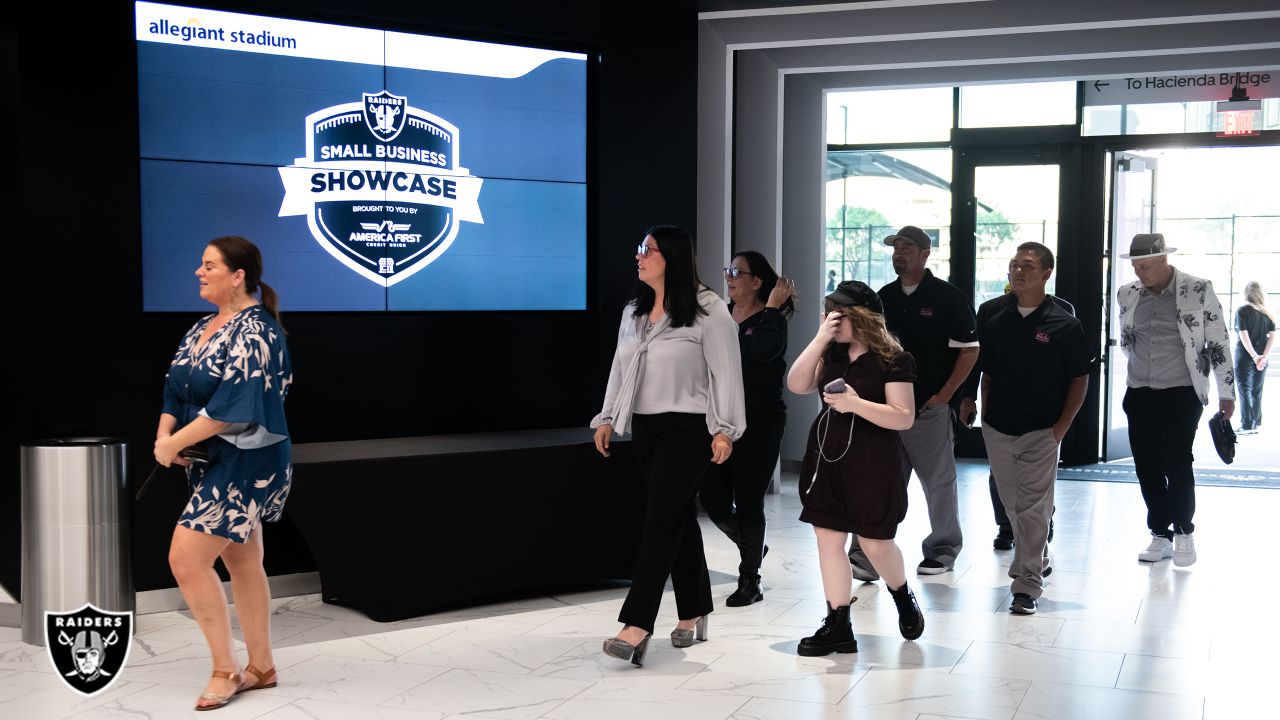 A man poses inside the Raider Image team store at Allegiant