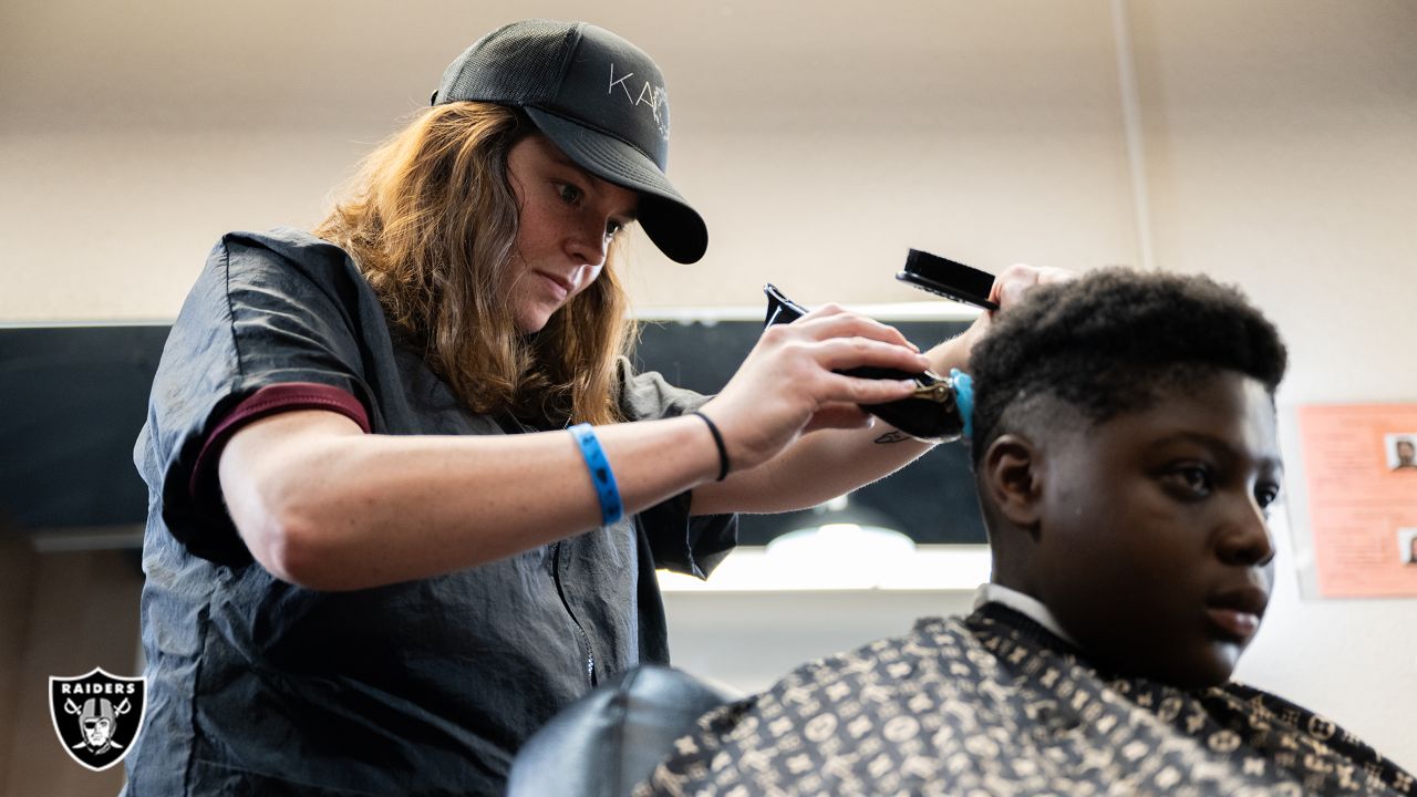 Las Vegas Raiders help local students with back-to-school haircuts