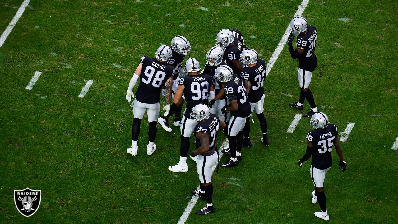 Raiders safety Roderic Teamer (33) and Raiders cornerback Brandon Facyson  (35) celebrate a stop …