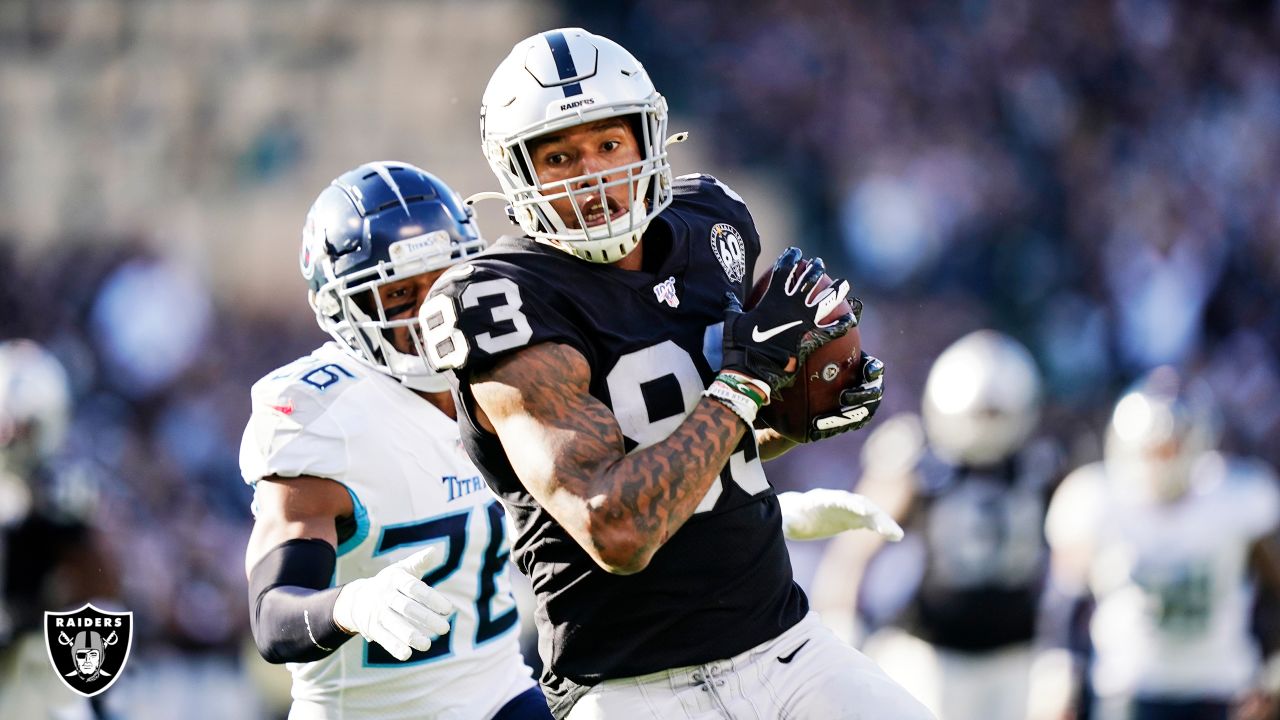 Raiders tight end Darren Waller (83) is tackled by Kansas City