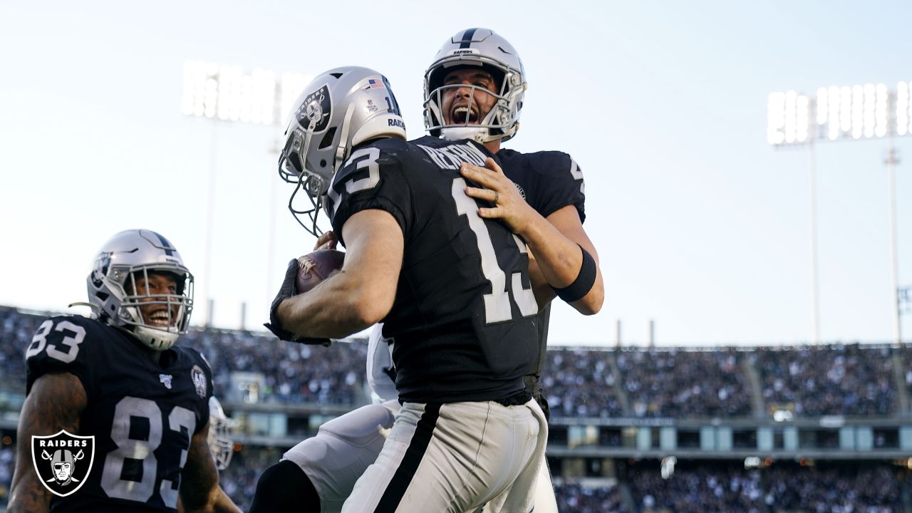 Las Vegas Raiders wide receiver Hunter Renfrow (13) celebrates with  teammate quarterback Derek …