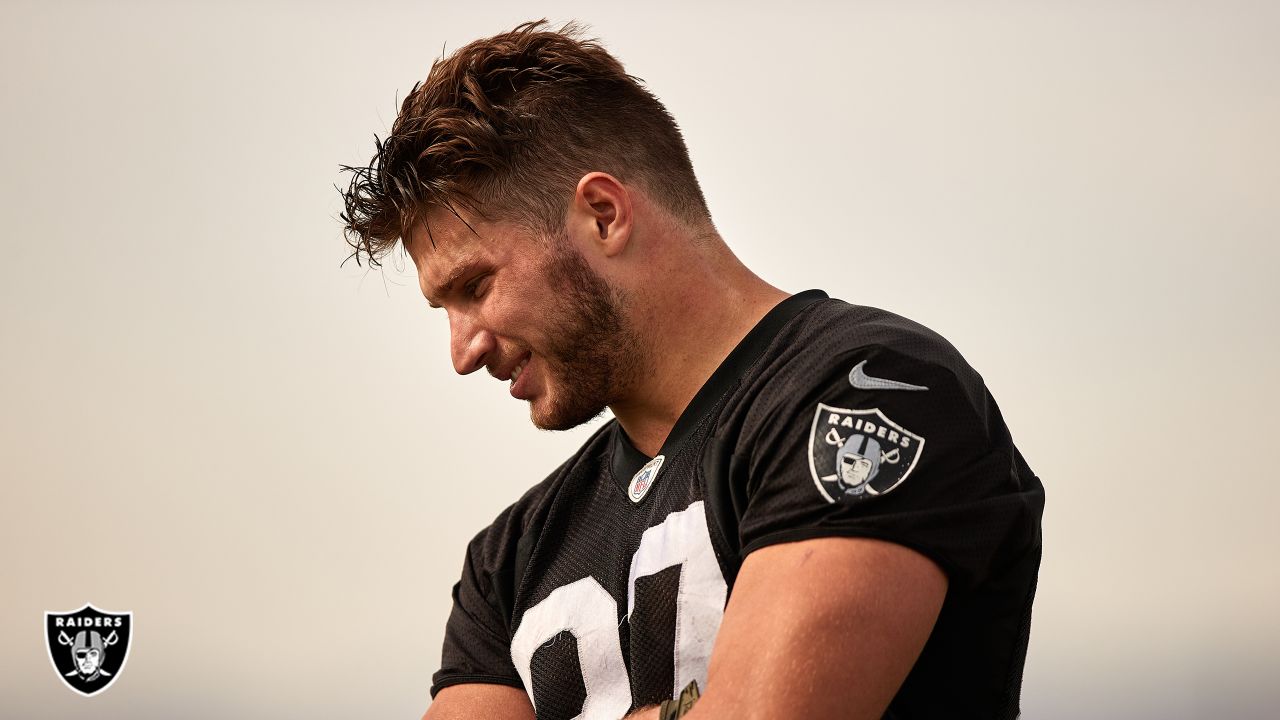 Raiders tight end Foster Moreau (87) gestures to a reporter during a news  conference after an N …