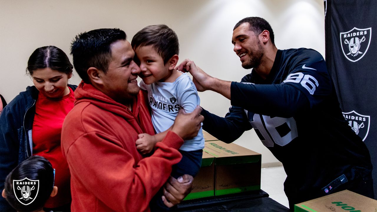 We didn't have a lot, but we did have family': Nate Hobbs, Tashawn Bower  spend quality time with North Las Vegas families during meal donation