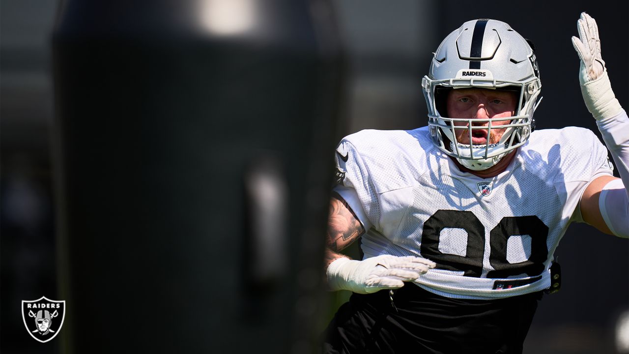 Las Vegas Raiders defensive end Maxx Crosby (98) celebrates after a big  defensive stop in the f …