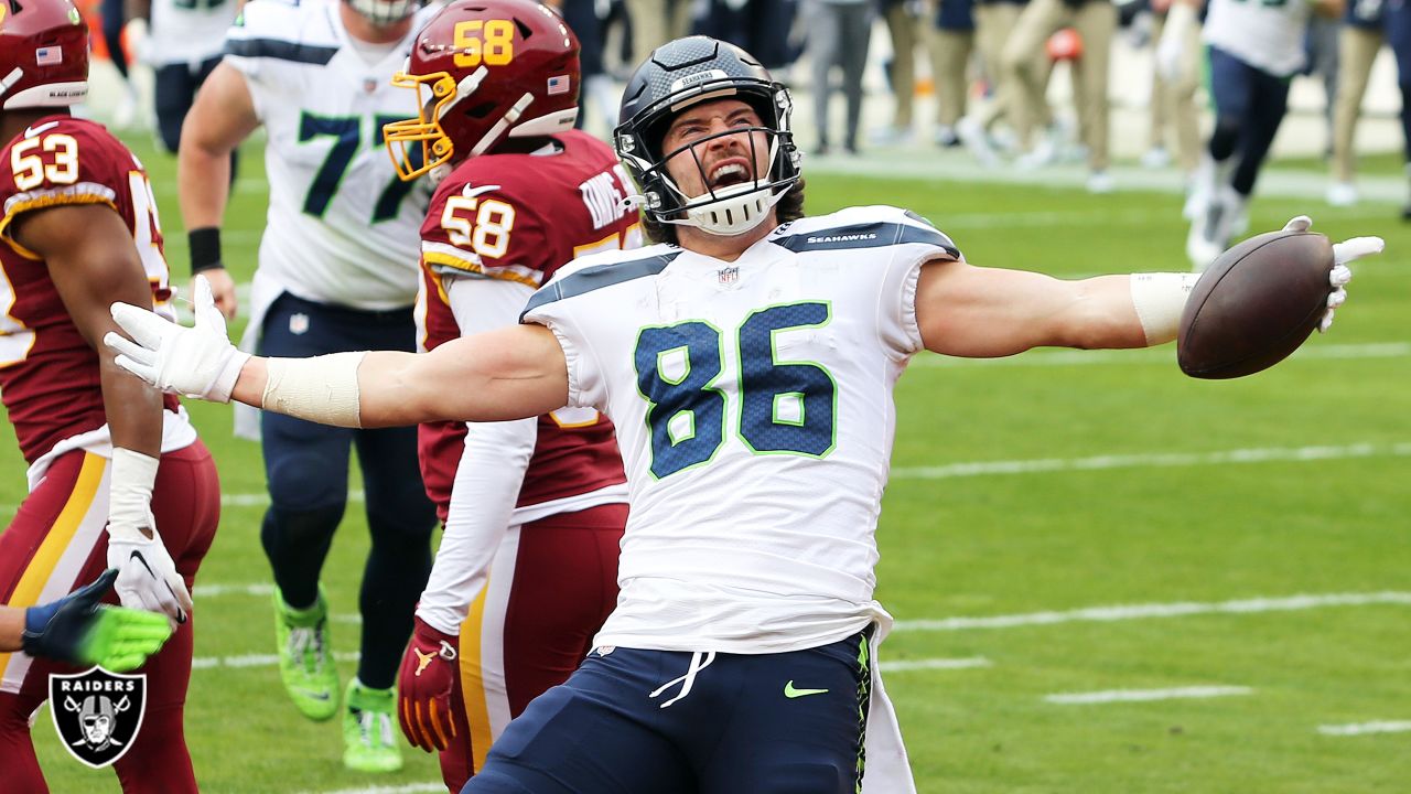 Seattle Seahawks' Jacob Hollister gets ready to toss a ball back at an NFL  football training camp Thursday, Aug. 1, 2019, in Renton, Wash. (AP  Photo/Elaine Thompson Stock Photo - Alamy