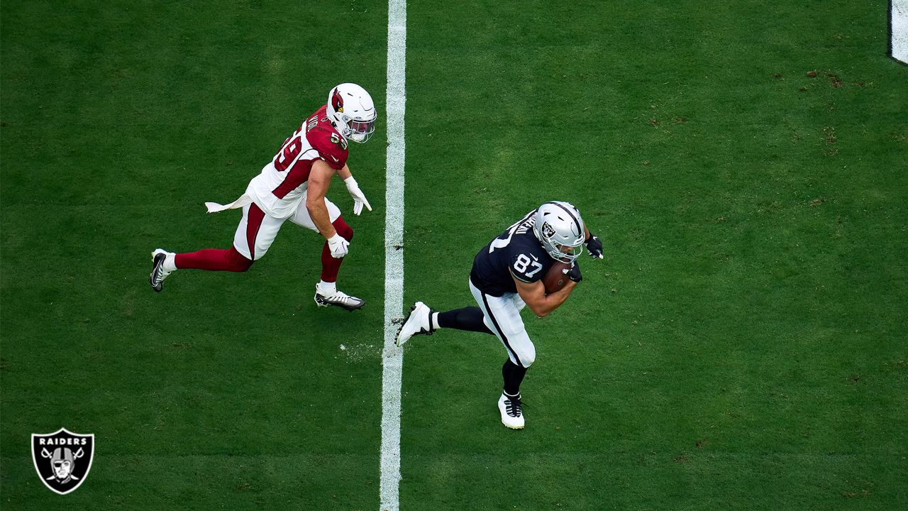 Las Vegas Raiders tight end Foster Moreau (87) prepares to spike