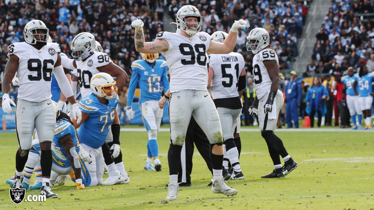 INGLEWOOD, CA - DECEMBER 08: Oakland Raiders defensive end Maxx Crosby (98)  celebrates a tackle with safety Duron Harmon (30) during the NFL game  between the Oakland Raiders and the Los Angeles