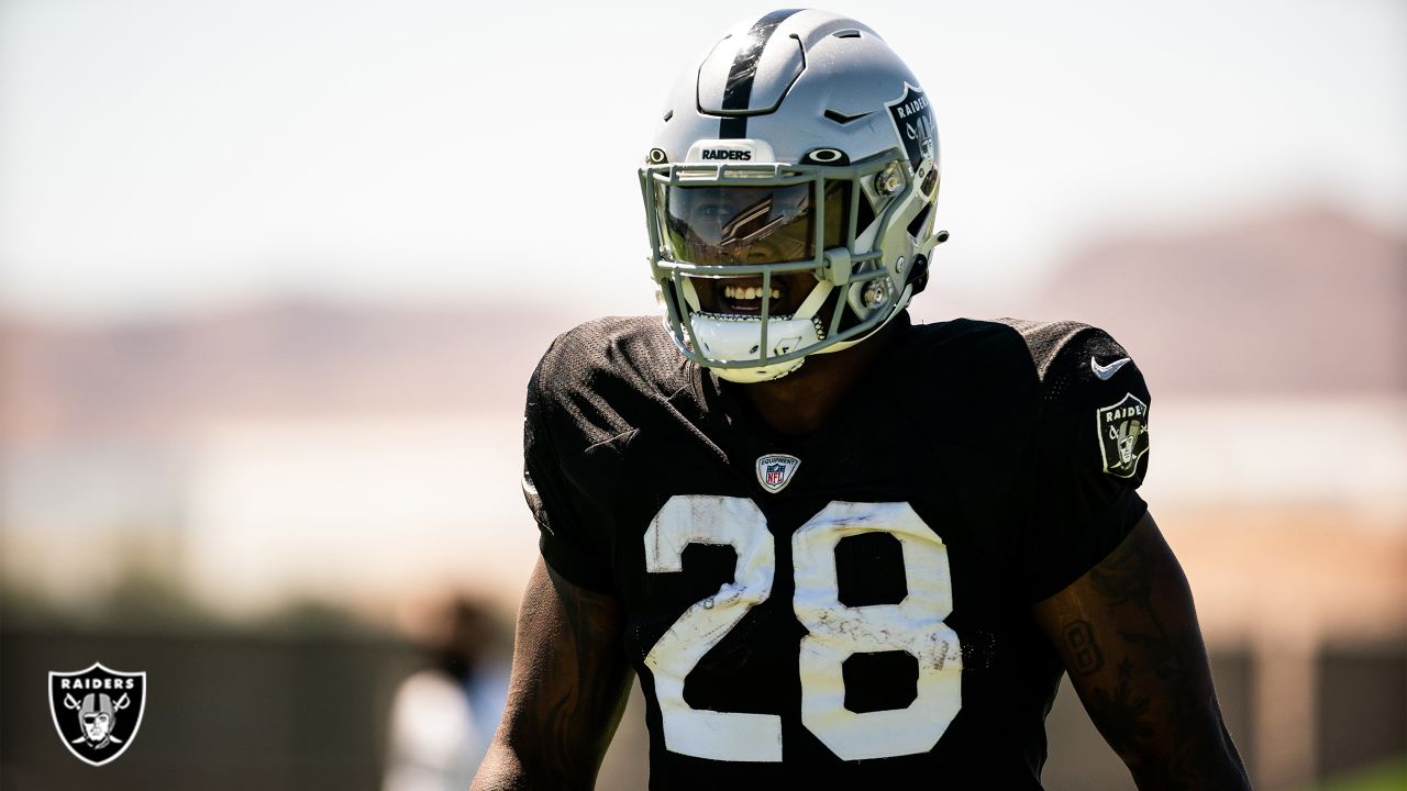 Las Vegas Raiders running back Josh Jacobs (28) practices during