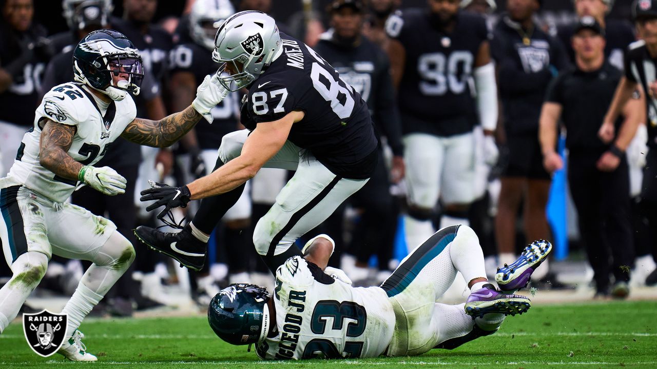 Las Vegas Raiders tight end Foster Moreau (87) prepares to spike the  football near teammate run …