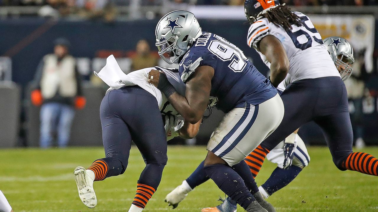 Las Vegas Raiders defensive tackle Maliek Collins (97) stretches