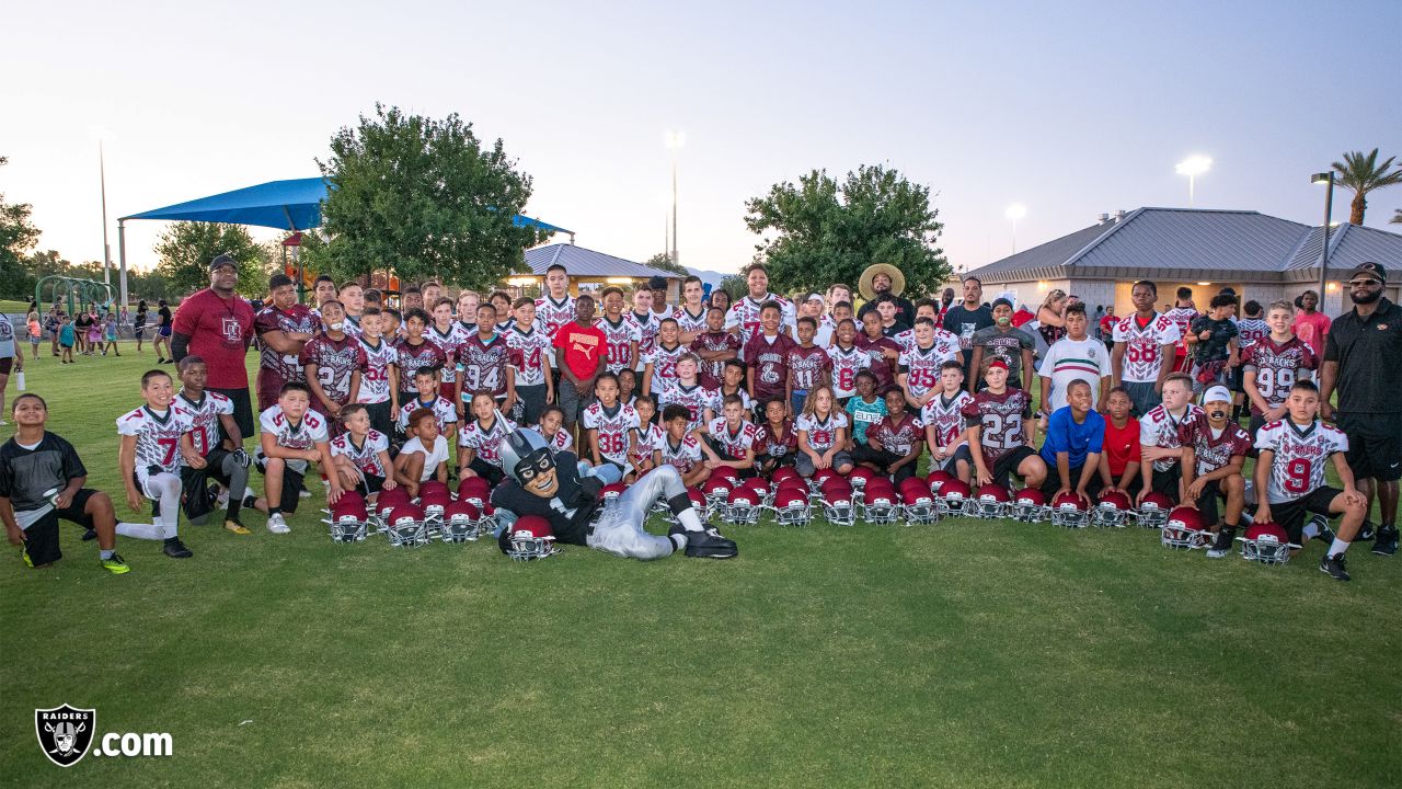 Raiders donate helmets to Las Vegas youth