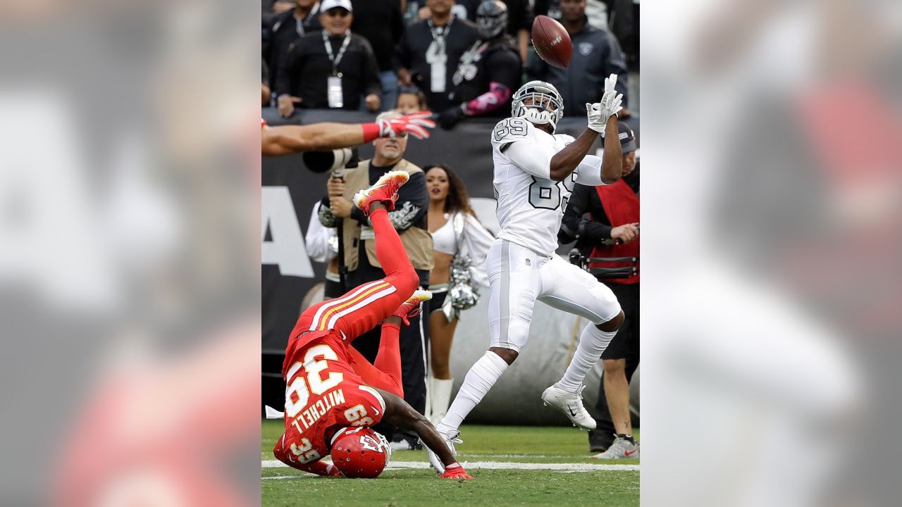 Las Vegas Raiders vs. Kansas City Chiefs. NFL Game. American Football  League match. Silhouette of professional player celebrate touch down.  Screen in Stock Photo - Alamy