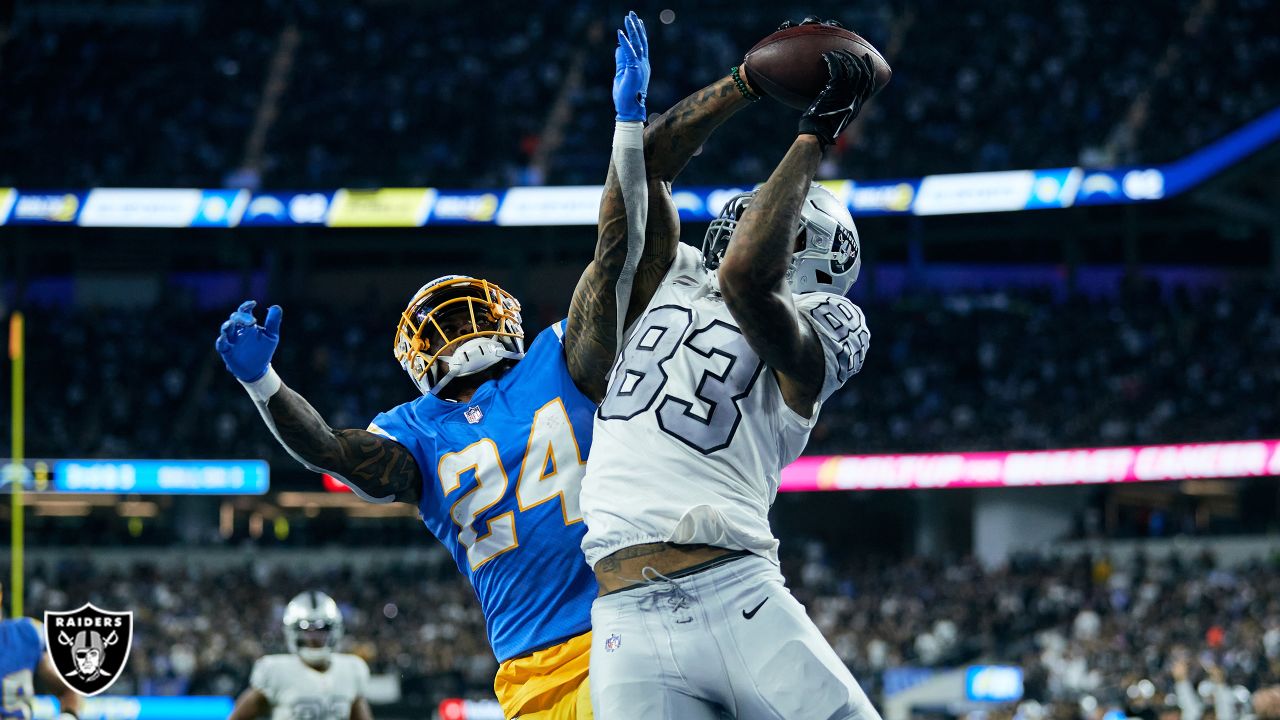 Las Vegas Raiders tight end Darren Waller pushes past Tyrann