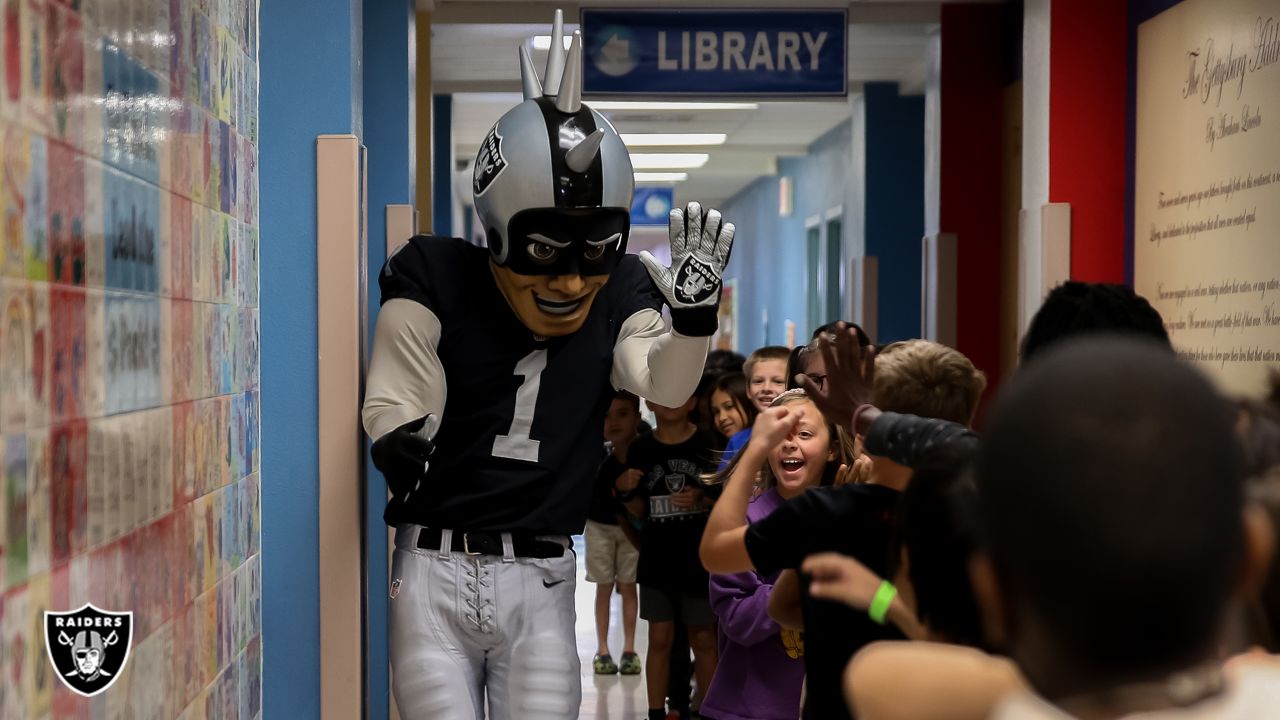 Photos: Raider Rusher takes part in Spirit Day at local school